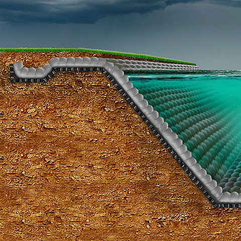 Depósito de retención de aguas pluviales sellado con un sistema de esteras de hormigón geosintético